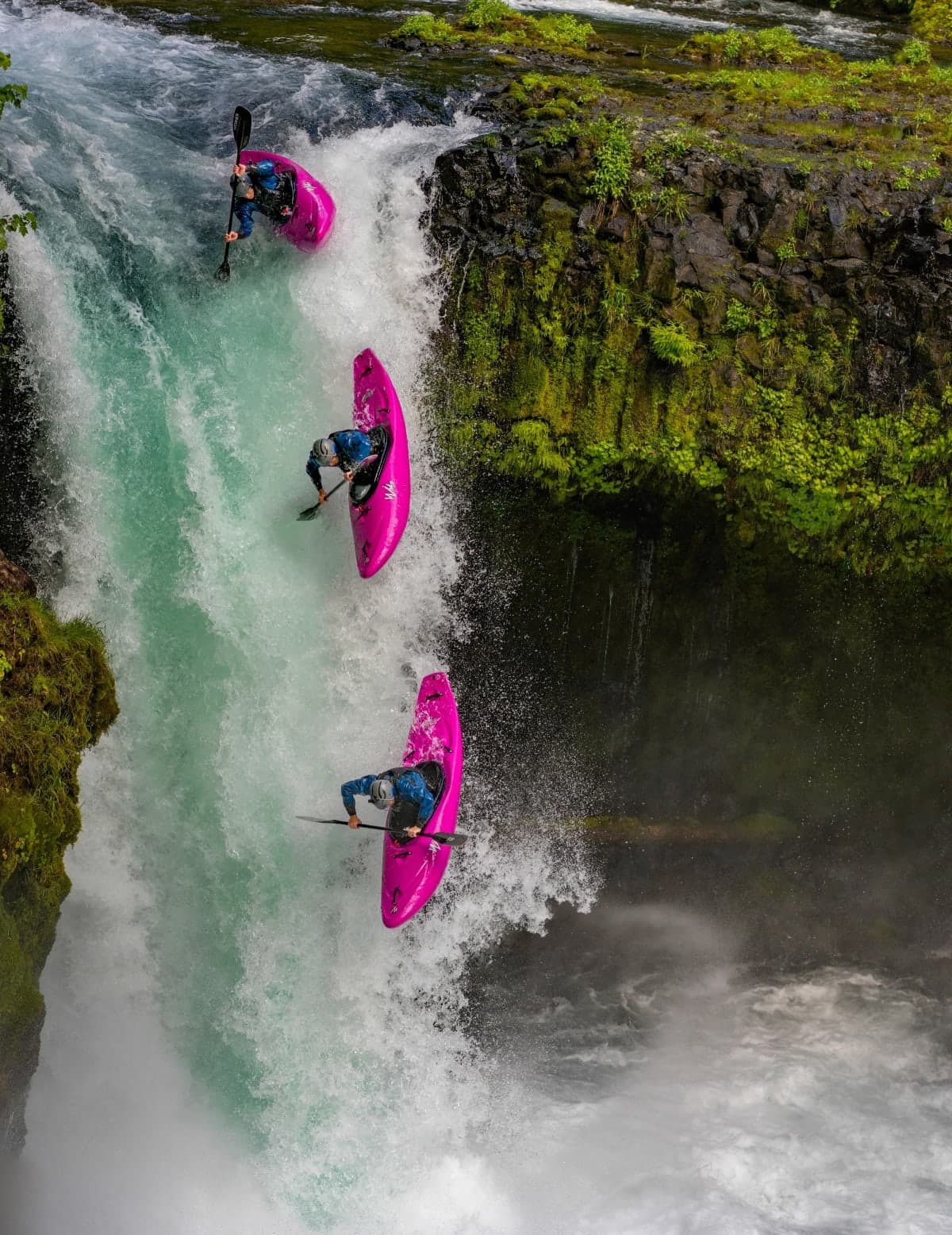Misty mountain valley at dawn with winding river